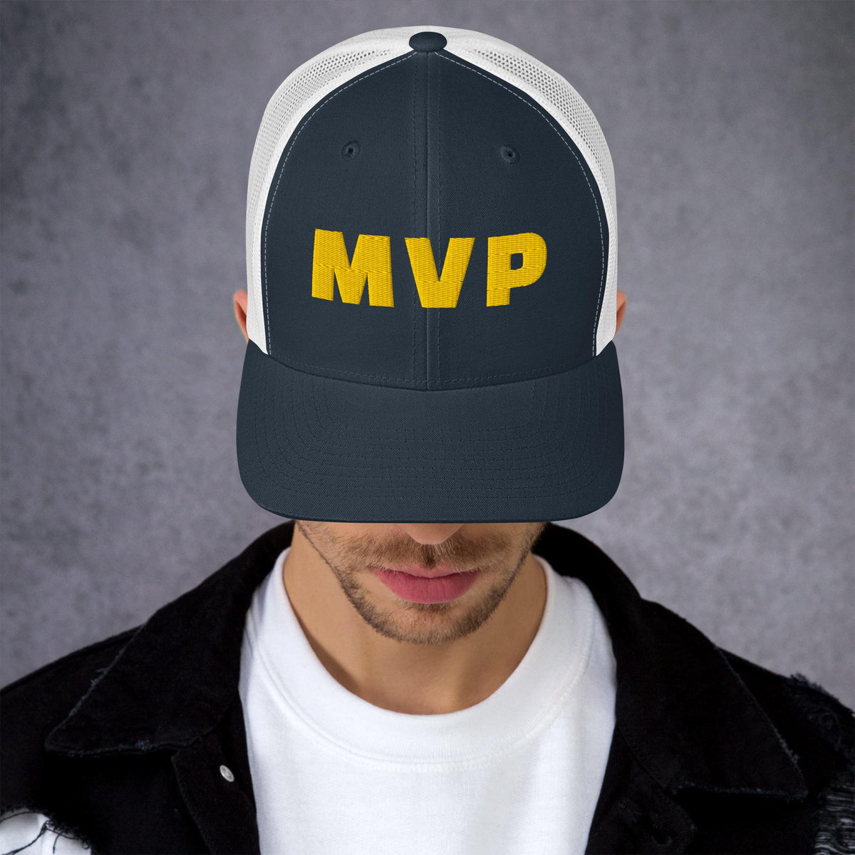Navy and white trucker hat with gold MVP embroidered lettering